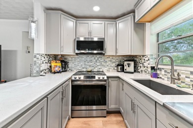 Discover exceptional lakeside living in this rare, rentable