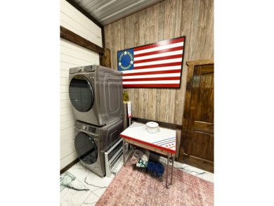 Welcome to low-maintenance living in an unbeatable location