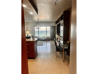 Beautifully furnished 1-bedroom condo with direct ocean views