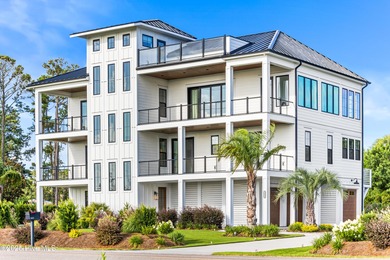 Imagine gliding home along River Road at golden hour, the Cape