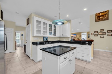 Marsh views from this 2 story, Raised Beach home surrounded by