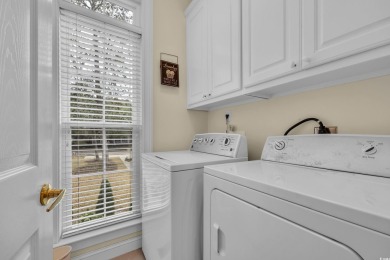 Marsh views from this 2 story, Raised Beach home surrounded by