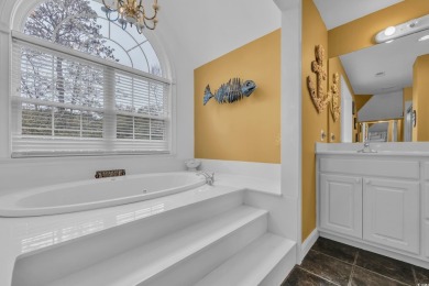 Marsh views from this 2 story, Raised Beach home surrounded by