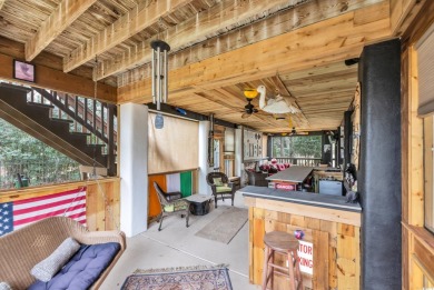 Marsh views from this 2 story, Raised Beach home surrounded by