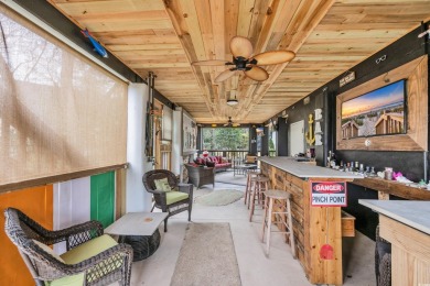 Marsh views from this 2 story, Raised Beach home surrounded by