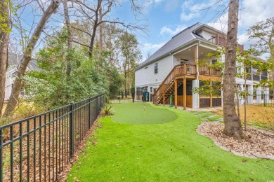Marsh views from this 2 story, Raised Beach home surrounded by