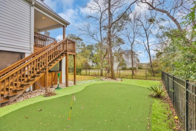 Marsh views from this 2 story, Raised Beach home surrounded by