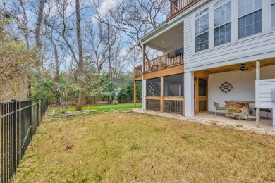 Marsh views from this 2 story, Raised Beach home surrounded by