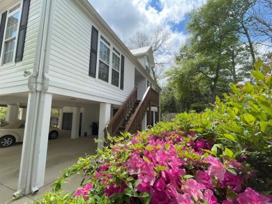 Marsh views from this 2 story, Raised Beach home surrounded by