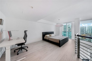 Discover a blend of minimalism and luxury in Brickell with this