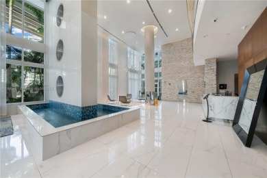 Discover a blend of minimalism and luxury in Brickell with this