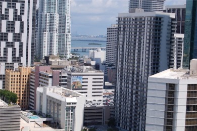 Discover a blend of minimalism and luxury in Brickell with this