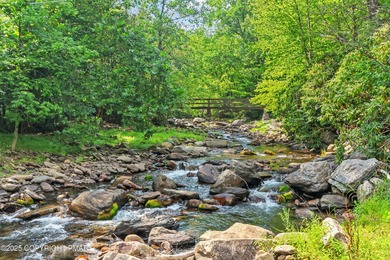 ESCAPE TO YOUR OWN PRIVATE PARADISE with this EXCEPTIONAL