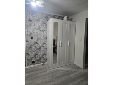 YOU OWN THE LAND! NO LOT FEES! 2nd master bedroom in front has