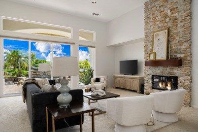 The beautifully relandscaped front yard with faux grass, exotic