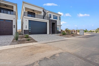 This stunning new construction contemporary home offers