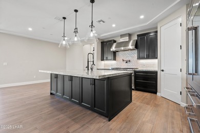 This stunning new construction contemporary home offers