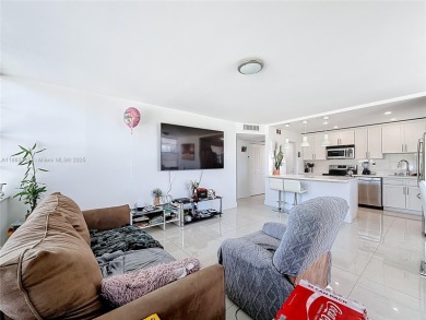 Welcome to this beautifully maintained third-floor condo in the