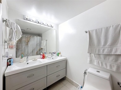 Welcome to this beautifully maintained third-floor condo in the