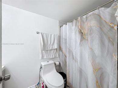 Welcome to this beautifully maintained third-floor condo in the