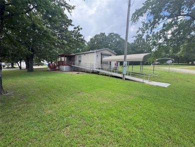 Welcome to 27 Bokchito St in Canadian! This 3-bedroom, 2 bath