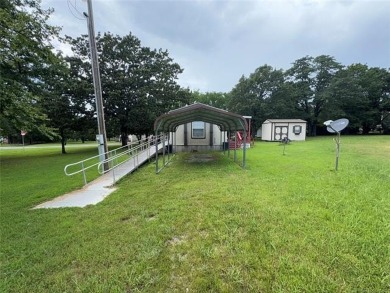 Welcome to 27 Bokchito St in Canadian! This 3-bedroom, 2 bath