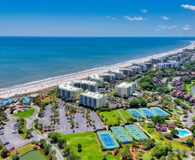 Relax in this charming oceanfront getaway, perched on the 4th