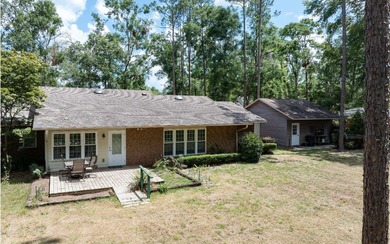 This charming 2,220 sq. ft. brick home is on one of the larger