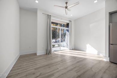 Lakeside living. First level condo conveniently situated on NCSU