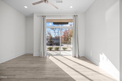 Lakeside living. First level condo conveniently situated on NCSU