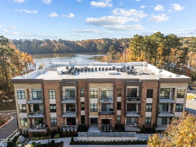Lakeside living. First level condo conveniently situated on NCSU