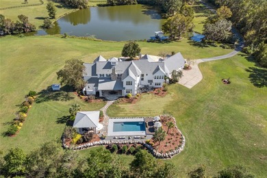 Welcome home to Estate Living at its Finest! This custom-built