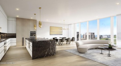 Experience luxury oceanfront living in this exceptional