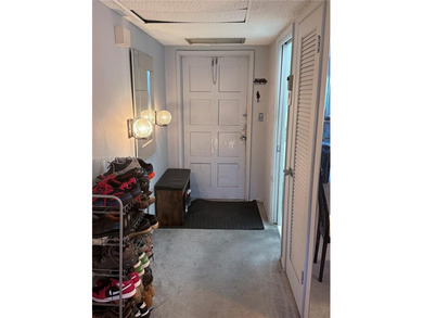 Welcome to this spacious 2 bed, 2 bath condo at 3250 N Palm Aire