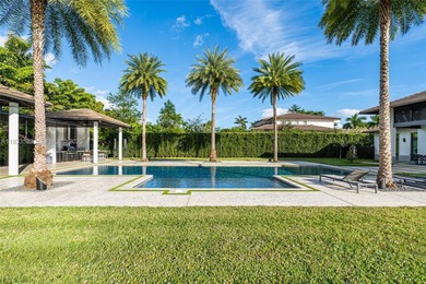 Upon entry, a breathtaking resort-style pool with Bali-inspired