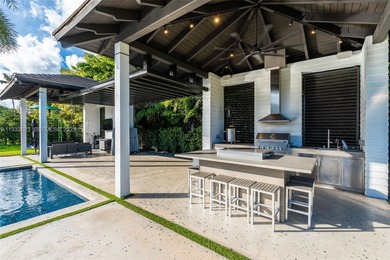 Upon entry, a breathtaking resort-style pool with Bali-inspired