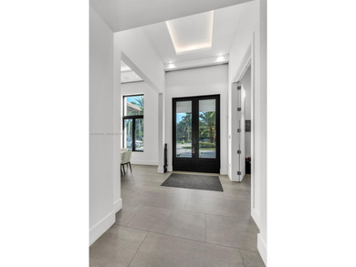 Upon entry, a breathtaking resort-style pool with Bali-inspired