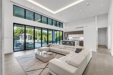 Upon entry, a breathtaking resort-style pool with Bali-inspired