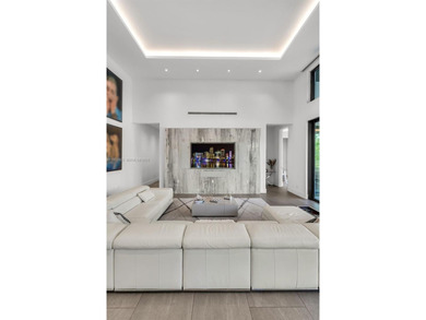 Upon entry, a breathtaking resort-style pool with Bali-inspired