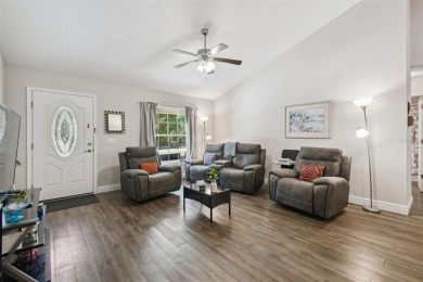 Tucked away on a VERY PRIVATE and SECLUDED .55-acre corner lot