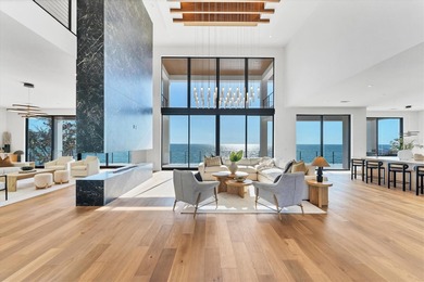 WELCOME TO ONE OF THE FEW BRAND-NEW GULF FRONT HOMES FOR SALE ON