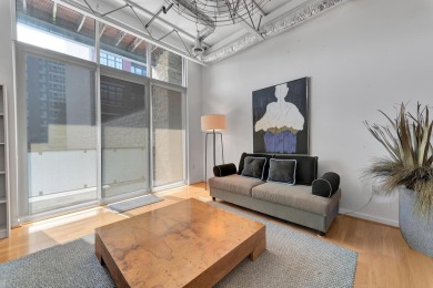 This open concept condo at Troy Street Lofts, a contemporary