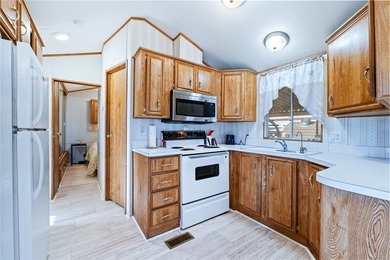 Welcome to resort-style living at its best! This charming