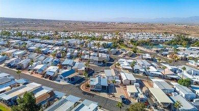 Welcome to resort-style living at its best! This charming