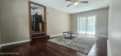 This beautiful 4-bedroom, 2- full bath, mother-daughter home is