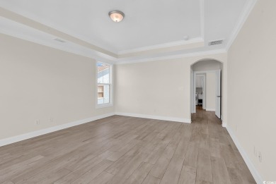 WE ARE ACCEPTING BACK-UP OFFERS.  Nestled just one row back from