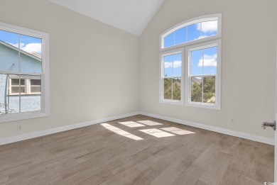 WE ARE ACCEPTING BACK-UP OFFERS.  Nestled just one row back from