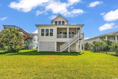 WE ARE ACCEPTING BACK-UP OFFERS.  Nestled just one row back from