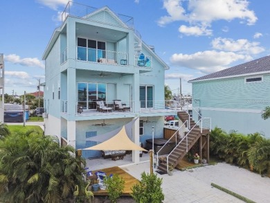 Stunning custom waterfront home. 3-bedroom, 3-bath, this