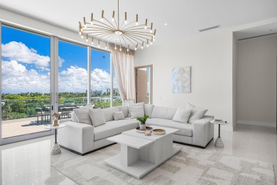 This exceptional just-completed penthouse at Aria offers a rare